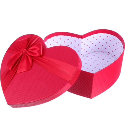 Red custom heart shaped gift box with ribbon and polka dot interior design