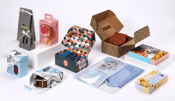 A variety of custom printed retail packaging boxes with colorful designs and finishes