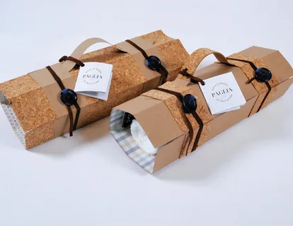 Unique eco-friendly packaging with cork and kraft paper handle for artisanal small business items