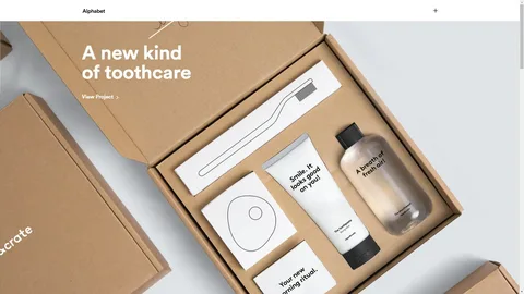 Eco-friendly minimalist packaging box for toothcare set with simple typography and natural kraft material.
