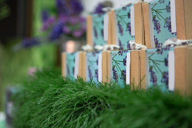 Floral patterned soap packaging boxes displayed for natural product branding