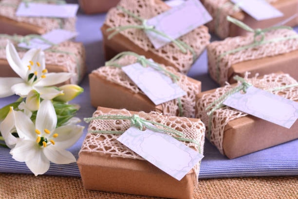 Rustic soap packaging with lace ribbon and blank label for personalized gift giving