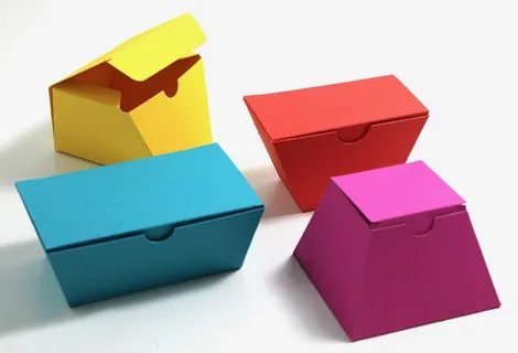 Assorted bright colored custom carton boxes with tuck flap closures for packaging design