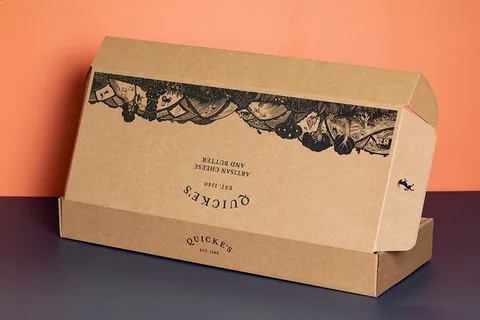 Custom kraft mailer box with intricate black printed artwork and branding
