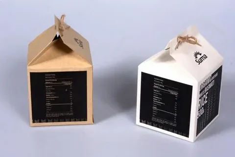 Eco-friendly rice packaging design in brown and white boxes.