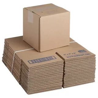 Stacked flattened cardboard boxes with one assembled box on top