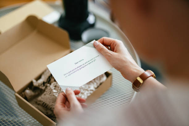 Close-up of a handwritten thank-you note inside a PR box adding a personal touch to brand gifting