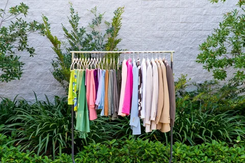 Outdoor clothing rack featuring sustainable and eco-friendly fashion apparel