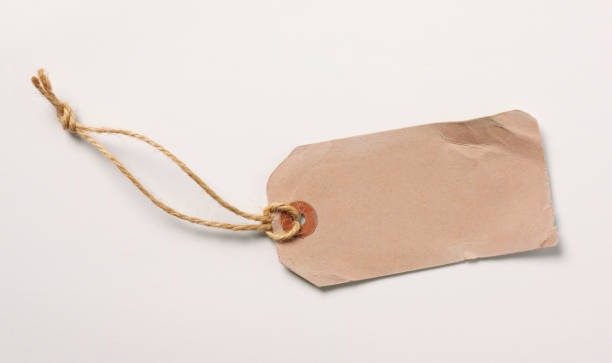 Plain kraft paper hang tag with rope string for minimalist custom label design.