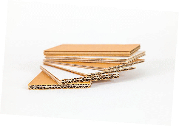 Samples of corrugated cardboard sheets in various thickness levels.