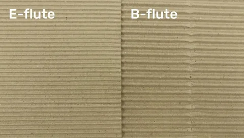 Side-by-side photo comparing E-flute and B-flute surfaces to illustrate smoothness and rigidity variations.
