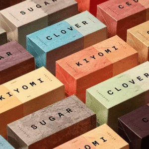 Minimalist soap packaging in assorted colors showcasing bold simplicity and modern branding.