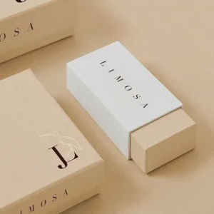 Minimalist cosmetic packaging design with subtle color palette and clean logo layout.