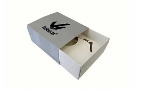 White sliding drawer carton box demonstrating innovative packaging design.