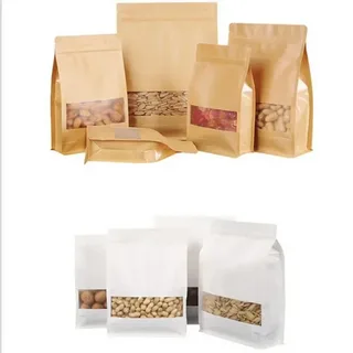 Different sizes of kraft and white bagged packaged goods pouches for food storage and retail display.