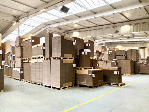 Warehouse with bulk corrugated boxes ready for shipping