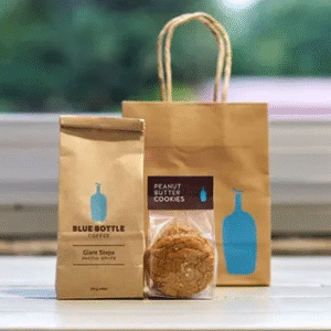 Coffee packaging design with kraft bag and paper accessories