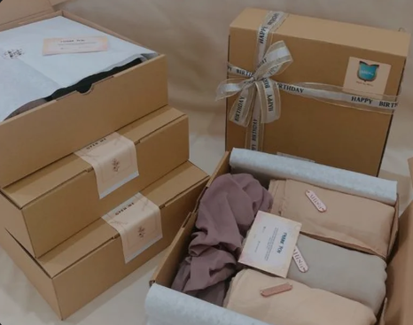 Premium set of custom mailer boxes for clothing showcasing organized, branded, and elegant e-commerce packaging.