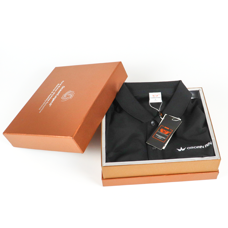 Premium rigid box with matte copper finish containing a neatly folded black shirt. Ideal for high-end fashion brands seeking to elevate brand perception through elegant unboxing experiences.