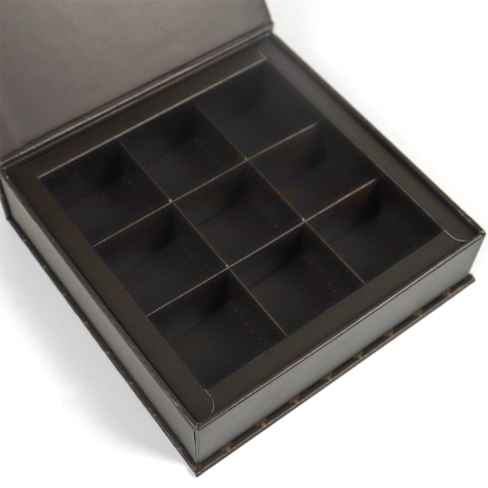 Dark brown paperboard compartment insert with grid layout, designed for durable and recyclable apparel packaging.