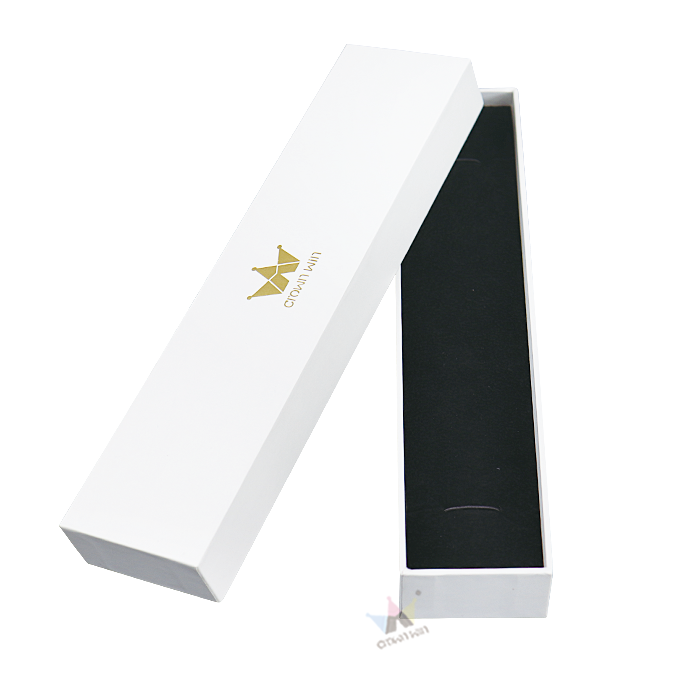 White rigid box with gold foil logo "CROWN WIN" and black interior lining, open to reveal clean, minimalist design suitable for high-end apparel.