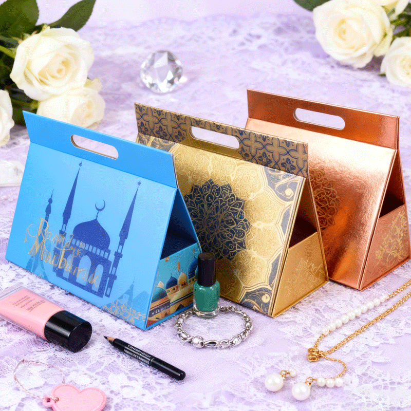 Blue, gold, and copper-colored carry boxes with Islamic-inspired designs, featuring metallic finishes and intricate patterns—ideal for special occasion packaging using Pantone spot colors and specialty inks.