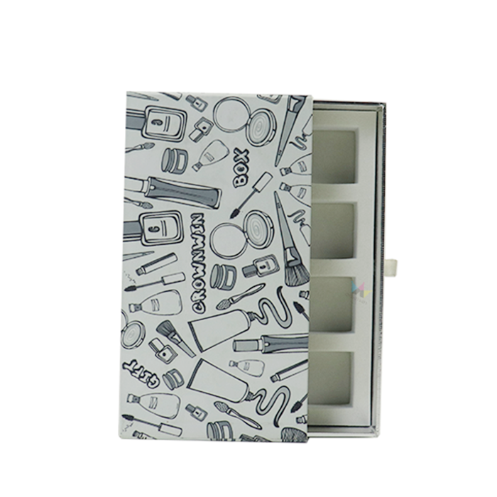 White cosmetic box featuring a pattern of illustrated beauty tools and a clear window, demonstrating foil embossing potential with bold graphic elements and metallic finishes.