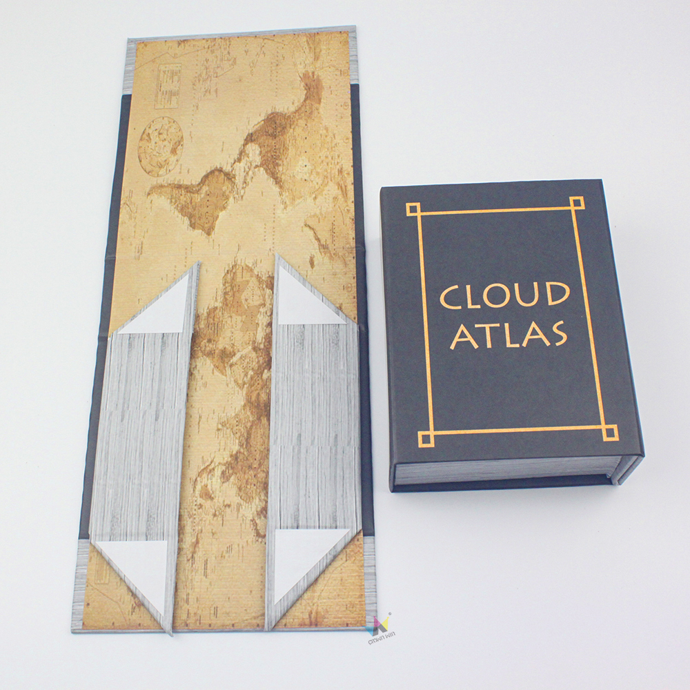 Inside a packaging factory: pallets stacked with finished white and brown rigid boxes alongside workers handling custom apparel packaging, illustrating large-batch manufacturing capabilities for both rigid and folding structures.