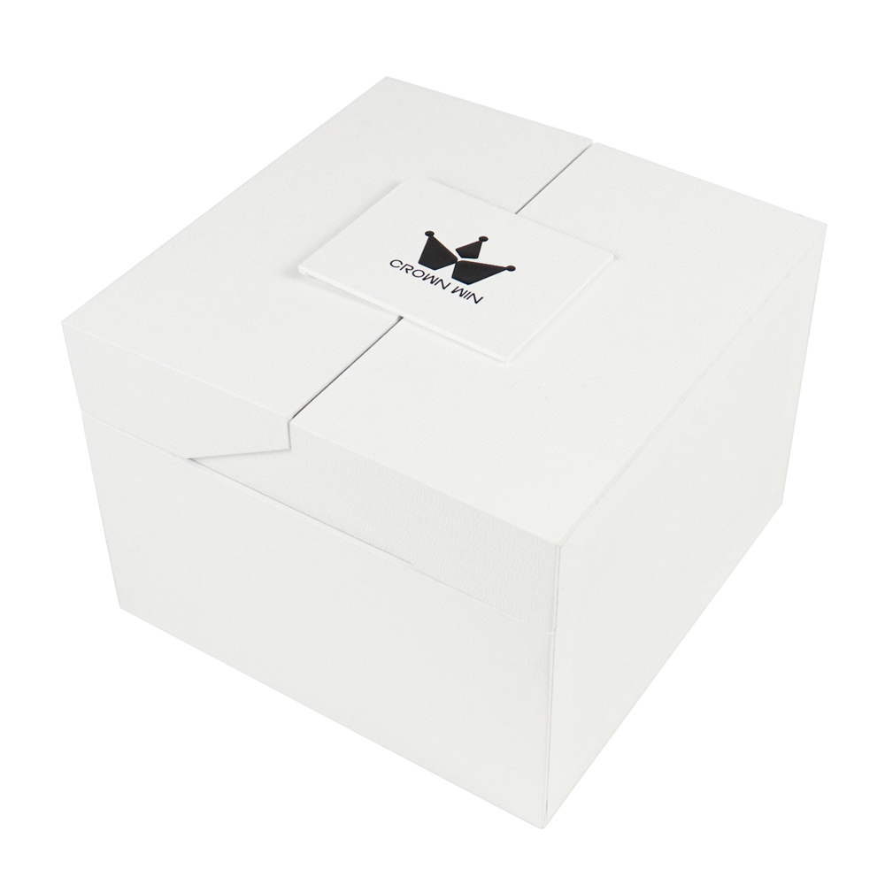 A sleek white rigid box with a minimalist black crown logo and magnetic closure—representing high-end apparel packaging that balances sustainability with premium feel, but often requires higher MOQs due to complex assembly and specialized materials.