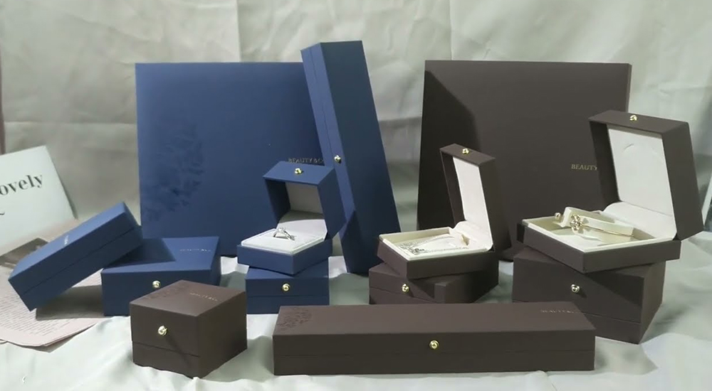 Custom jewelry packaging boxes showcasing premium ring, necklace, and bracelet packaging solutions for jewelry brands