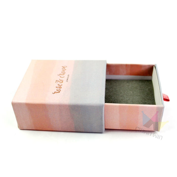 Pink and gray gradient rigid drawer box with gold foil logo "Rose & Crown" and soft-touch coating, designed for premium product presentation.