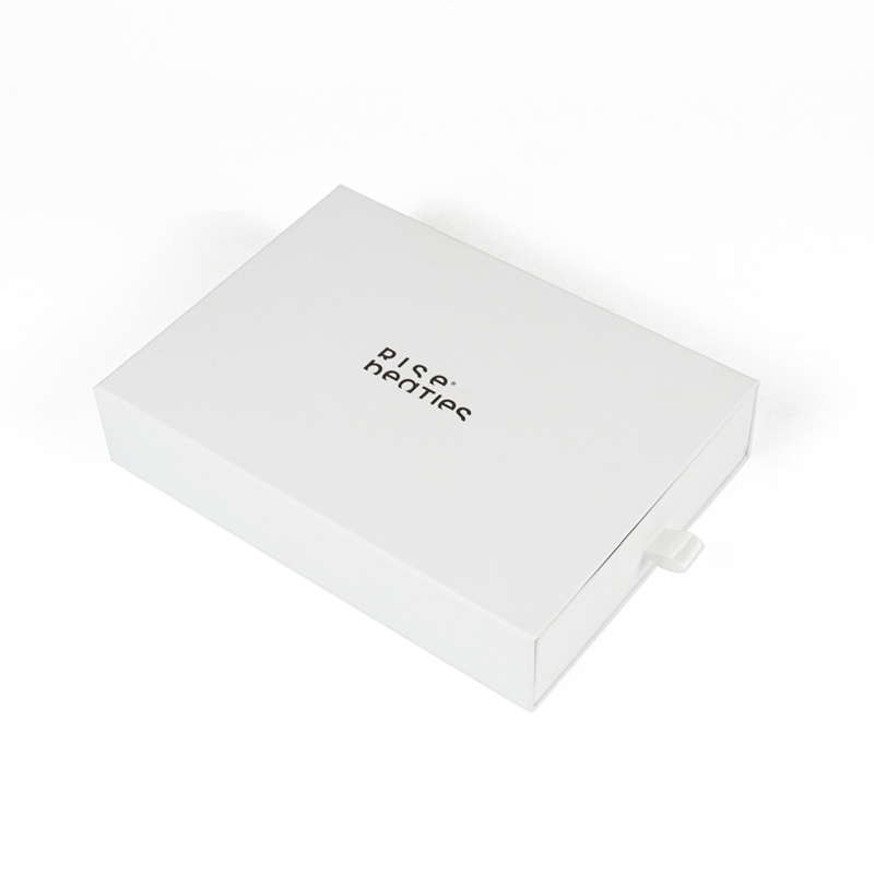 White rigid drawer box with black sans-serif typography reading "Rise Heaties," featuring a clean, modern design suitable for high-end product branding.