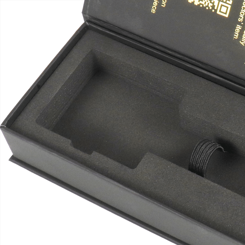 Open black rigid wine box featuring a precision-cut EVA foam insert with die-cut bottle cavity and neck support, designed to prevent movement during transit.