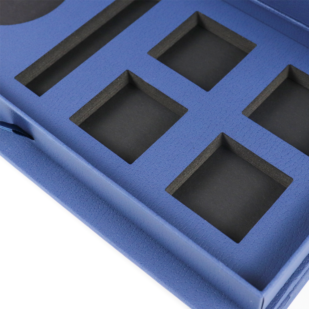 Two open drawer-style jewelry boxes in purple and brown, each featuring a branded crown logo and nested inner tray.