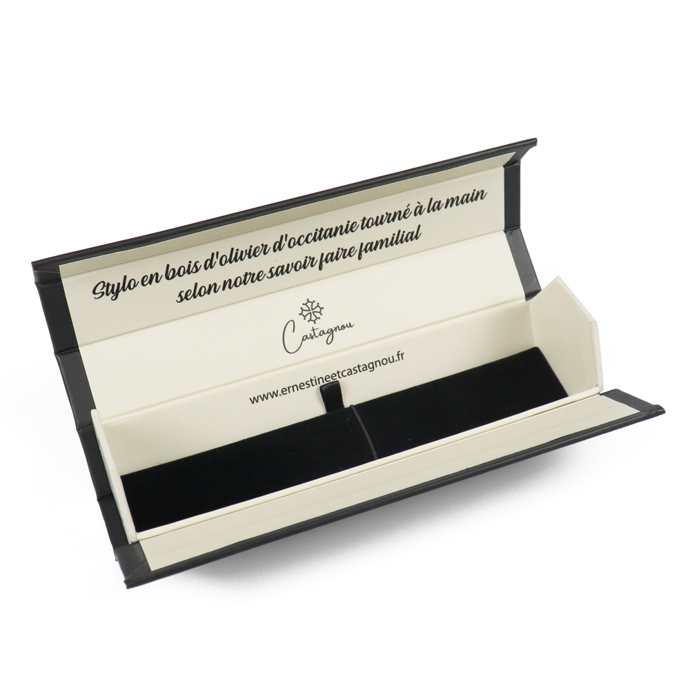 Open luxury-style box showing internal branding and printed text panel, demonstrating how fold lines and interior layout can impact warning label visibility and compliance.