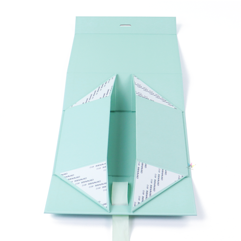 Light green tuck-end folding carton with internal support flaps and adhesive tape, designed for secure packaging of disposable vape devices.