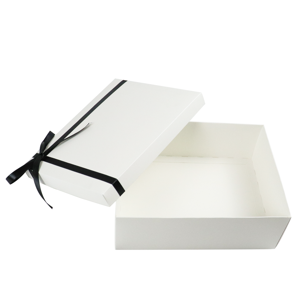 White square box with black ribbon and removable lid, showcasing an elegant design but lacking internal support for fragile vape cartridges.