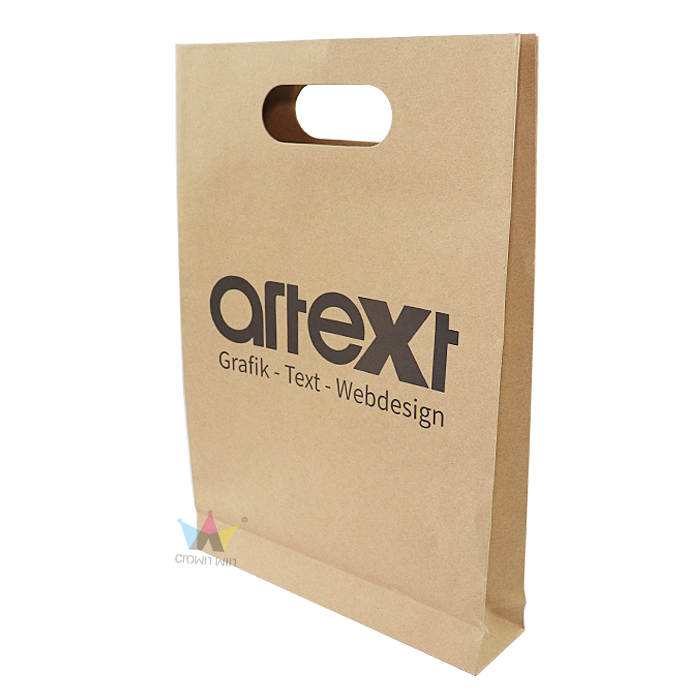 Brown kraft paper shopping bag with die-cut handle and black printed logo, ideal for sustainable fashion brands or businesses promoting environmentally responsible practices.
