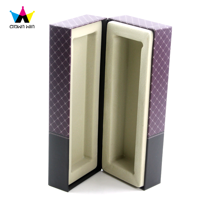 Hinged rigid box with diamond-patterned exterior and custom-molded foam insert, designed for secure product containment and structural integrity.