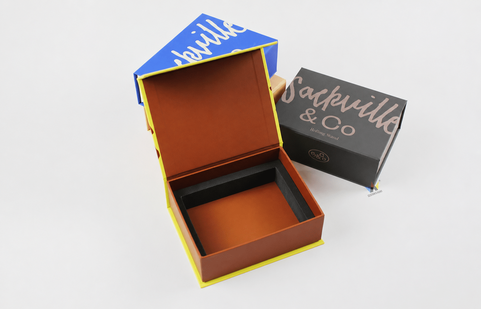 Custom printed pre-roll rigid packaging boxes with magnetic closure and protective black EVA foam inserts for premium multi-pack products.