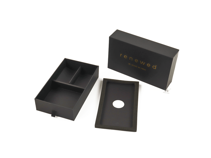 Custom black rigid gift box with gold foil logo, divided paper insert and removable foam tray for electronics, accessories and premium product packaging.