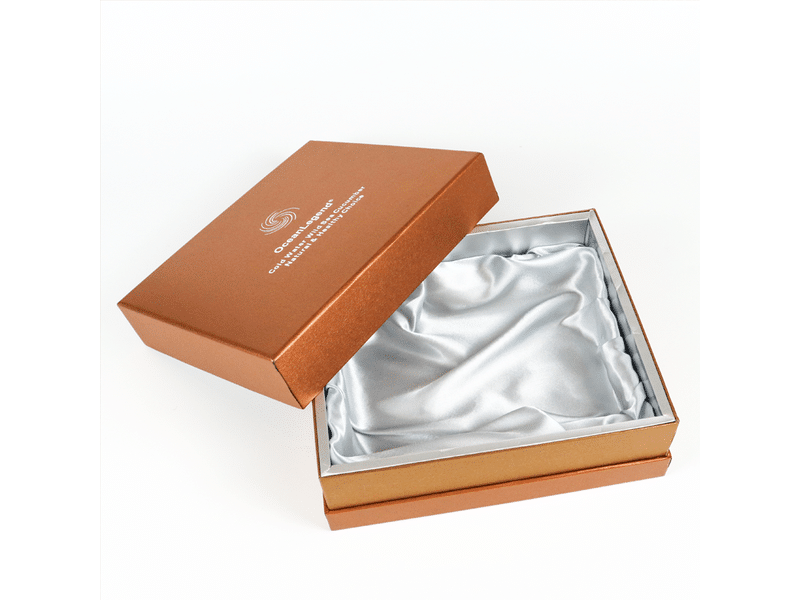 An open classic custom-designed lift-off lid rigid paper box with a visible silver neck/shoulder, lined with high-end shiny silver satin cloth for luxury gift display.