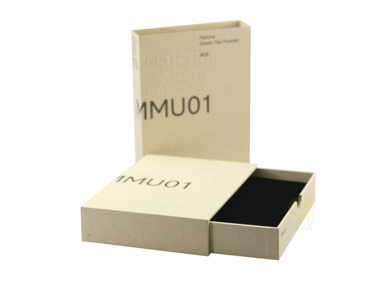 Custom beige slide-out drawer paper box with black insert and printed branding, designed for matcha green tea powder, food products and premium retail packaging.