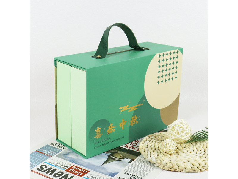 Custom green portable Mid-Autumn Festival gift box with carrying handle and gold foil printing, designed for mooncakes, tea and premium food packaging.