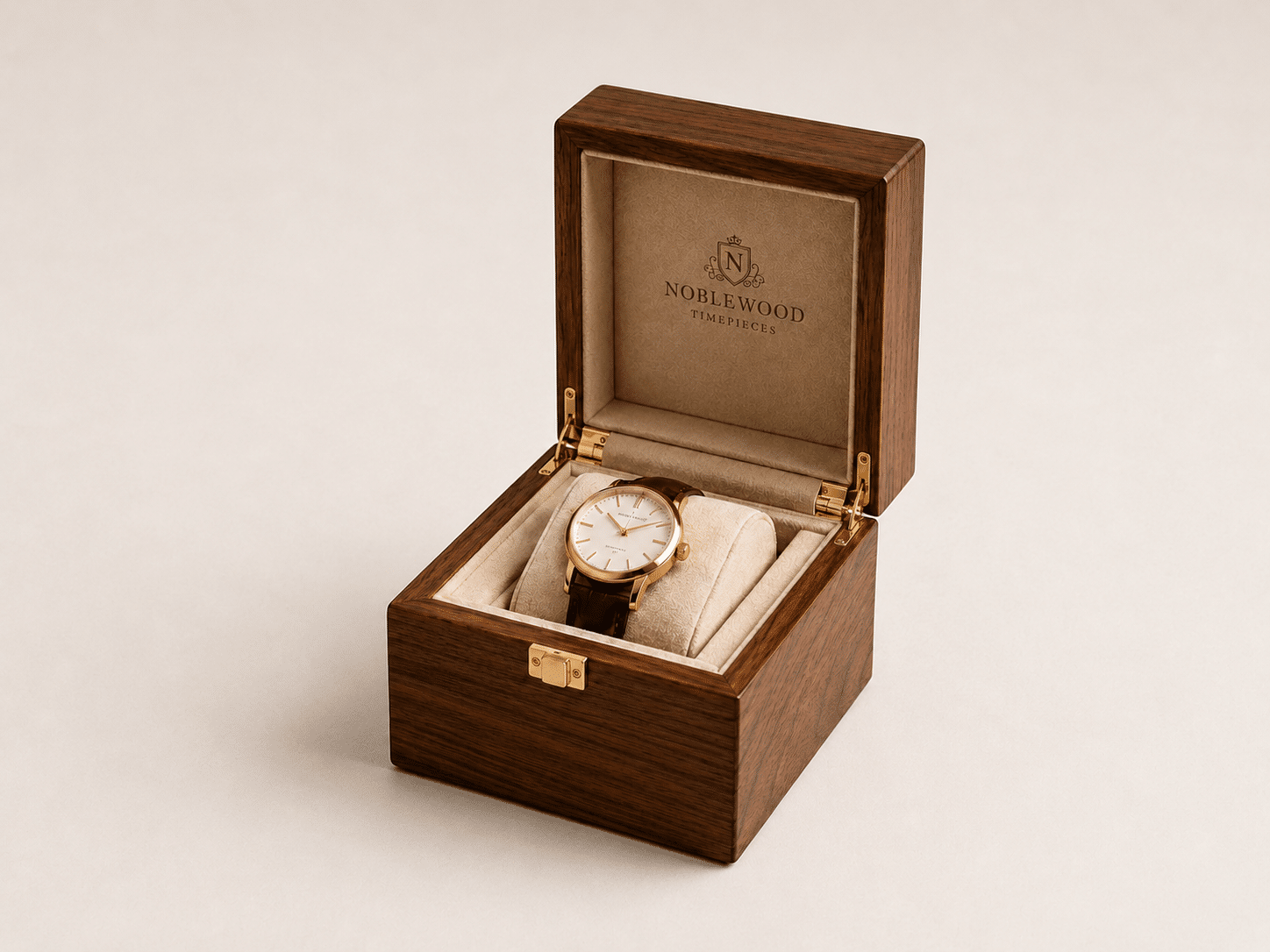 Premium custom walnut wooden watch box with a gold metal lock, open to display an elegant beige suede interior, custom embossed logo, and a plush watch holder pillow.