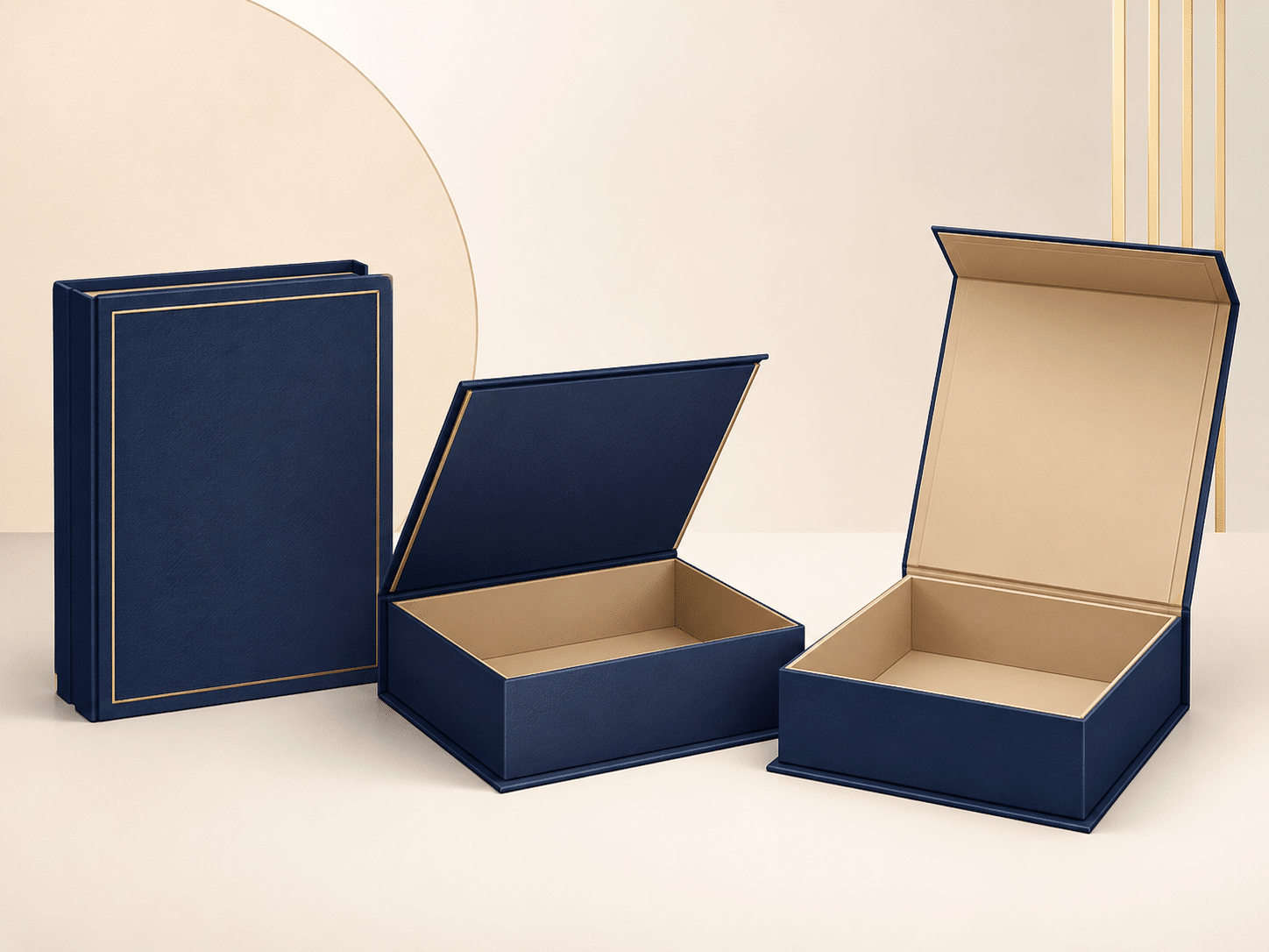 Custom navy blue book-style rigid gift boxes with hinged lids, beige interiors and elegant gold foil borders for luxury cosmetics, jewelry and premium product packaging.