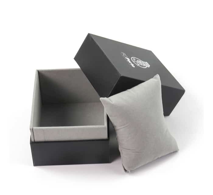 Open luxury black rigid gift box with soft velvet interior and pillow insert, designed for premium watch and jewelry packaging presentation.