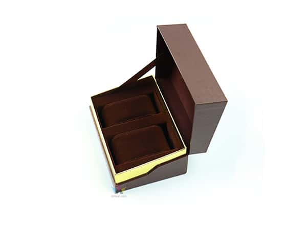 Luxury brown rigid watch gift box with soft velvet interior compartments, designed for premium wristwatch presentation and secure high-end packaging.