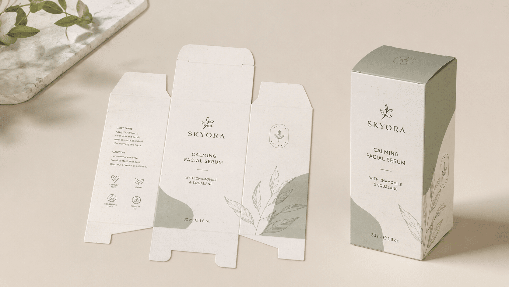 Custom skincare folding carton shown with printed dieline artwork and assembled facial serum packaging box.
