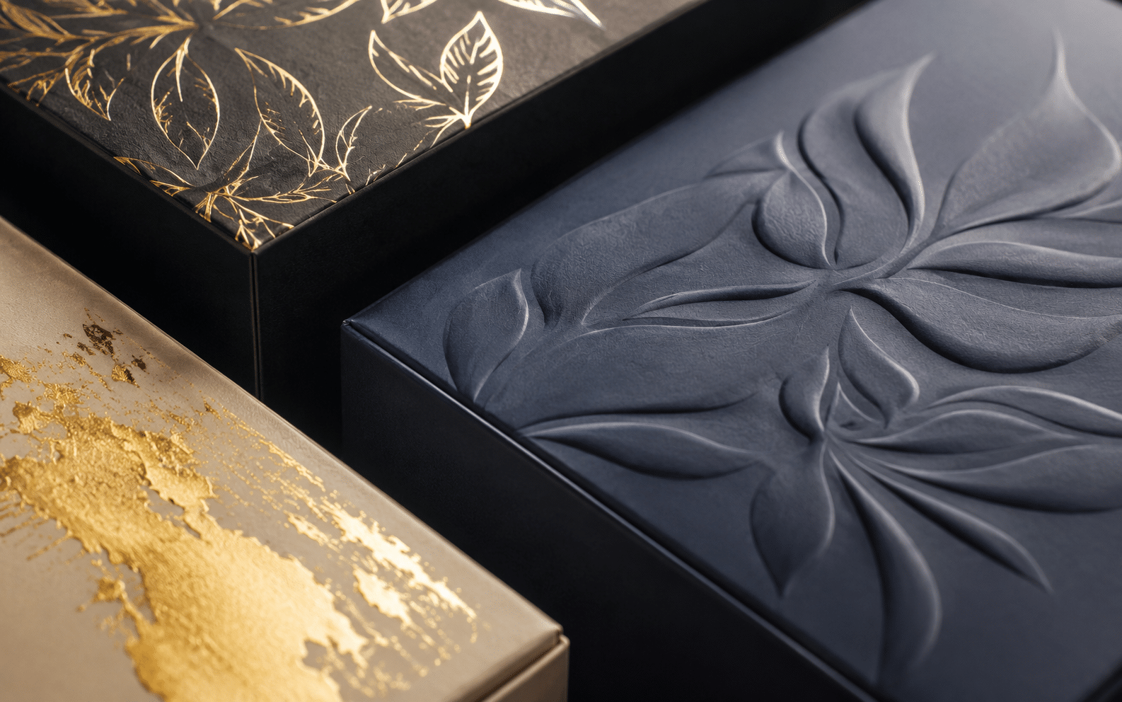 Luxury rigid boxes featuring gold foil stamping, embossing and raised decorative surface finishes
